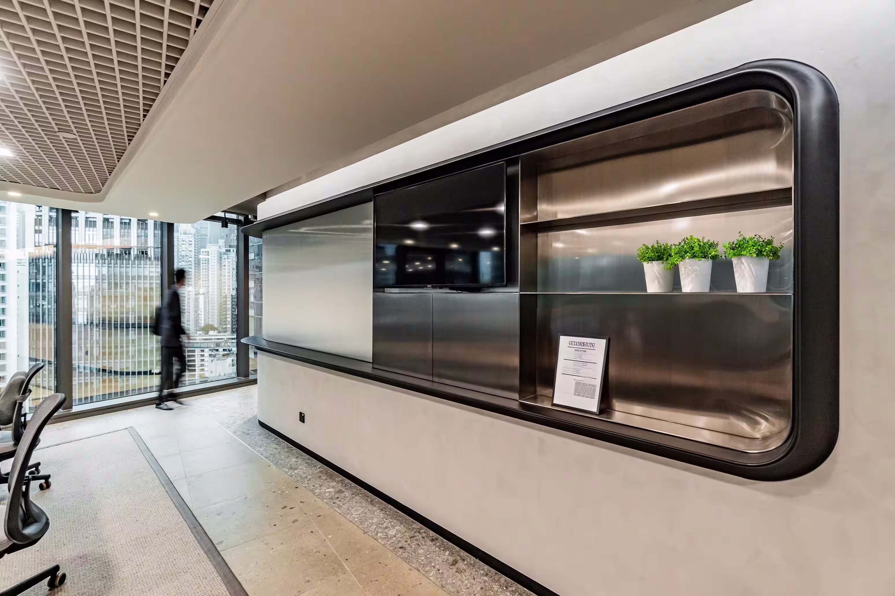 LFCH headquarters ceiling and services design in Sheung Wan Hong Kong showing integrated lighting and acoustic panels