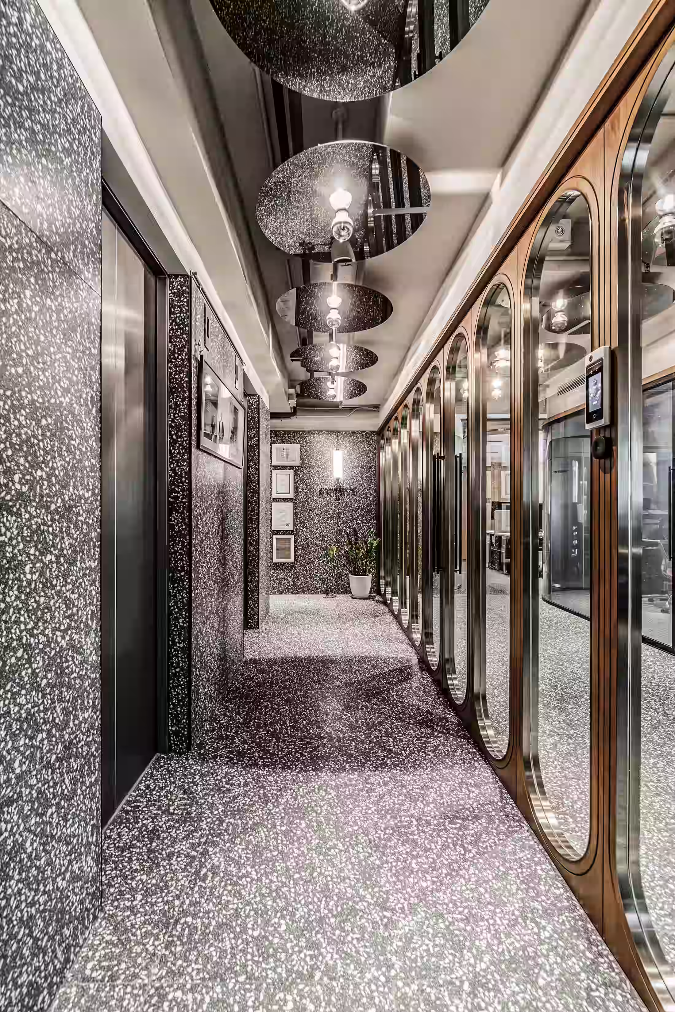 Private Capital office meeting nook or informal discussion area in Central Hong Kong with built-in bench seating