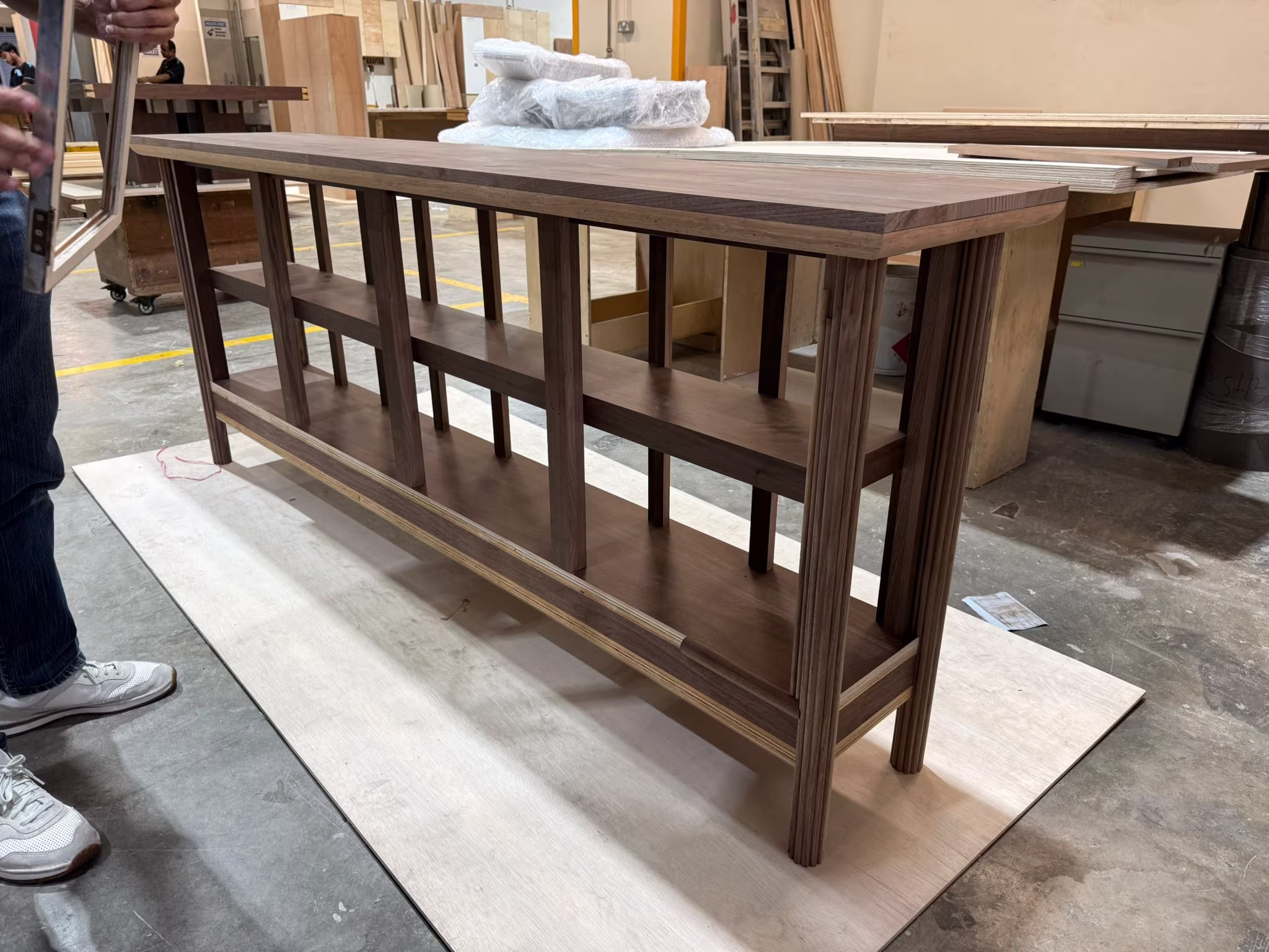 Construction progress photograph of Silvercrest Singapore office showing partition framing and MEP coordination during build