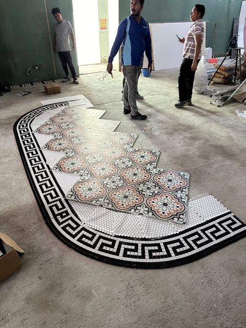 Construction progress photograph of the Oval Restaurant at the Singapore Cricket Club showing the verandah terrace area during refurbishment works