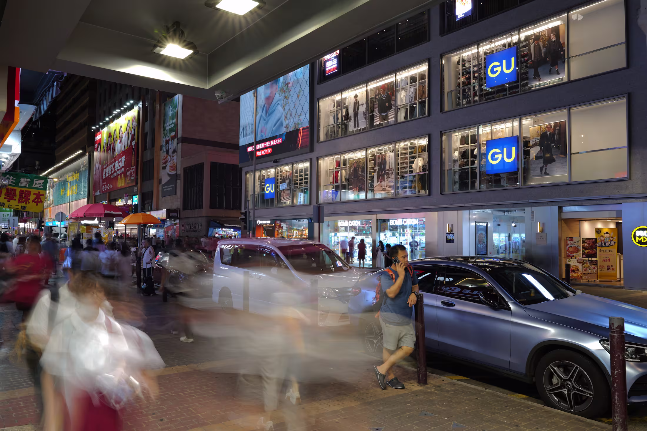 Yau Shing Commercial Centre podium corridor in Mong Kok showing renovated circulation and upgraded common area finishes