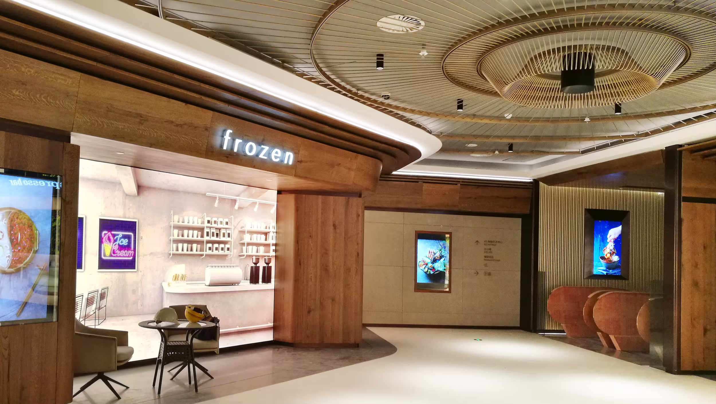 Completed frozen dessert kiosk at K11 ATELIER Ningbo with illuminated signage, timber panelling, and neon menu art.