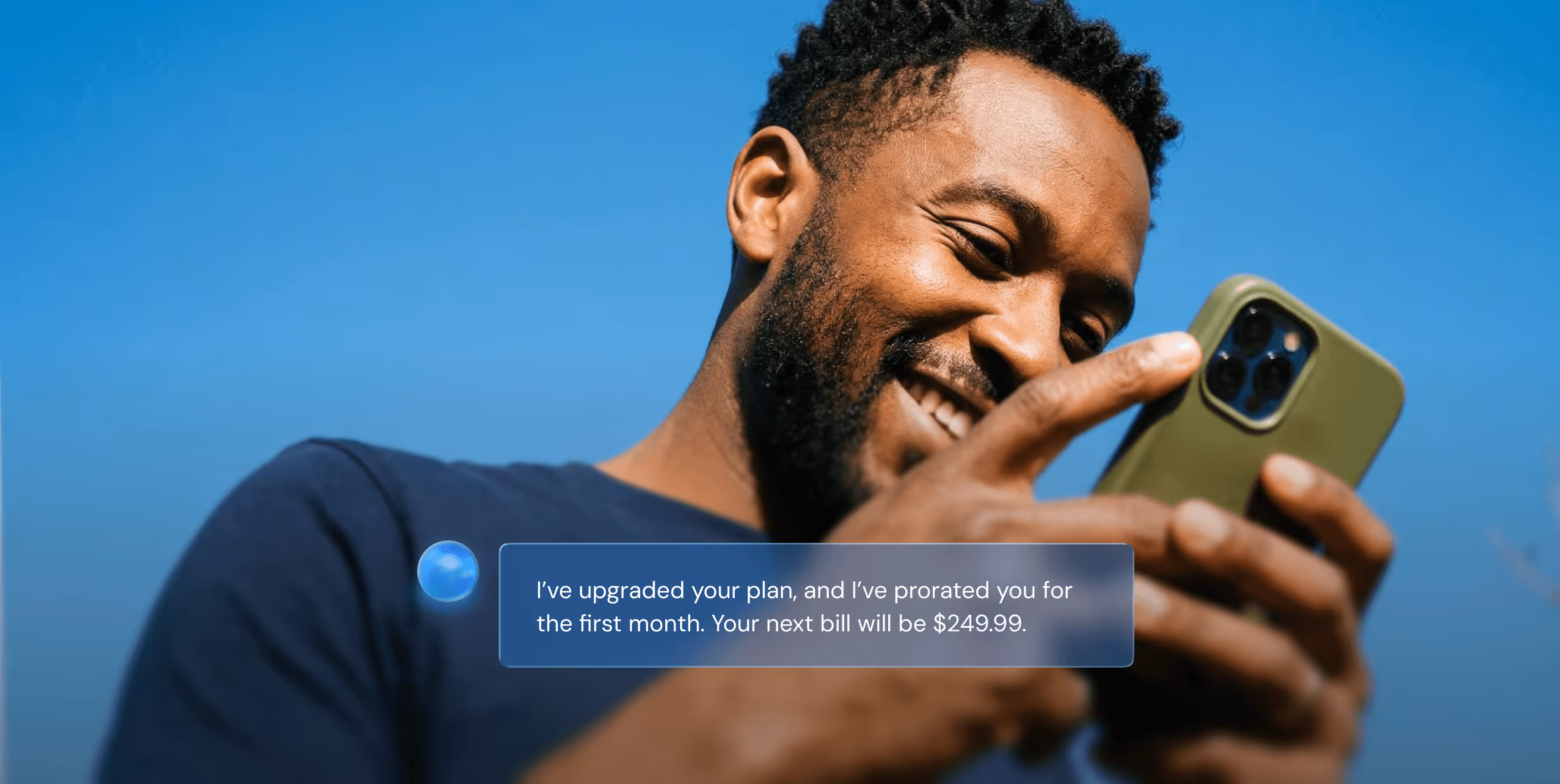 Smiling man holding a smartphone outdoors with text overlay about a plan upgrade and billing details.