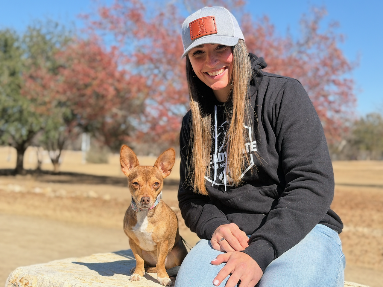 Trainer with dog on table
