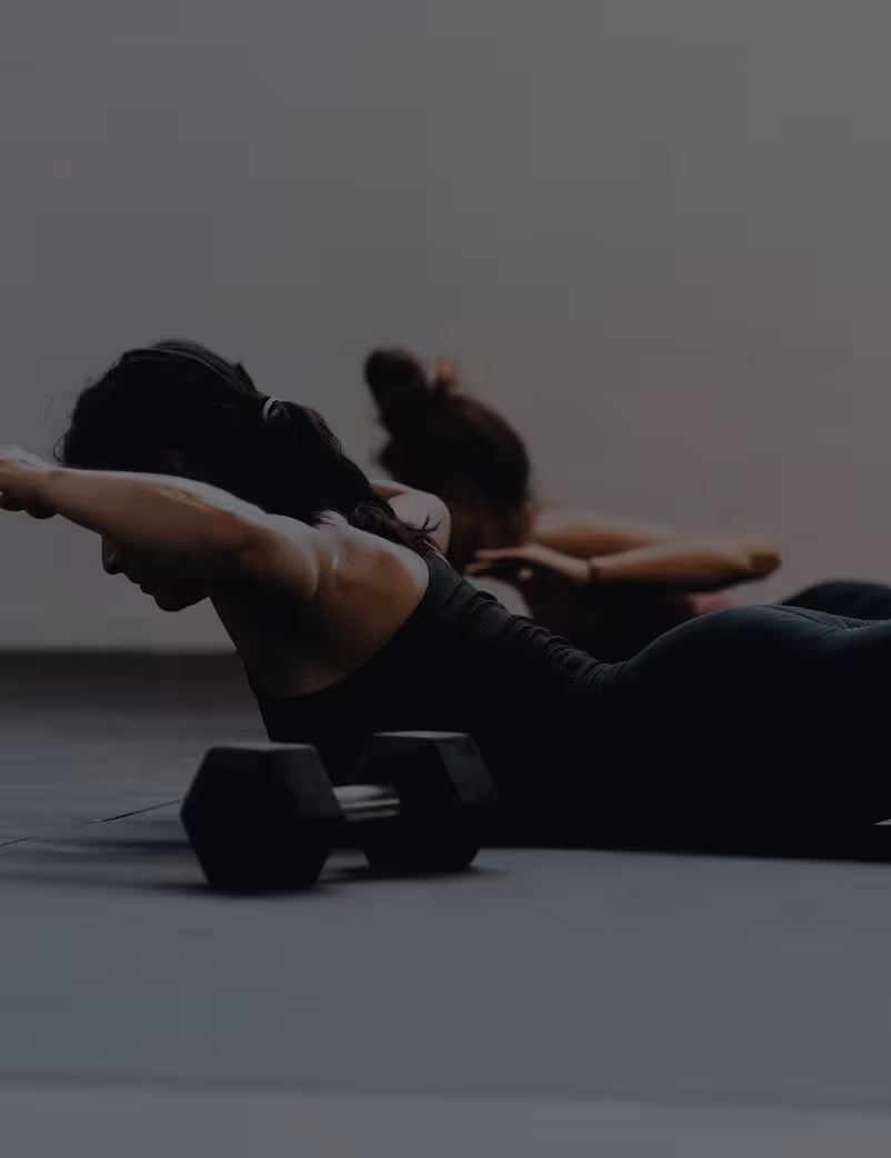 woman on floor lifting arms
