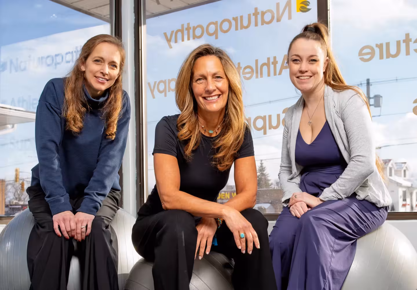 Three female health therapists