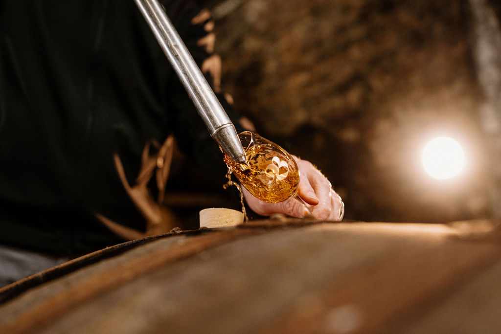Whisky drawn from a cask by valinch into a glass