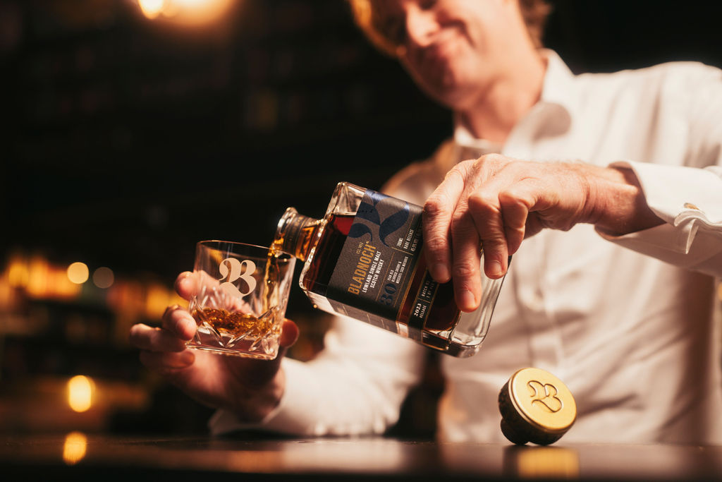 Nick Savage pouring Bladnoch 30 Year Old at The Last Bookstore