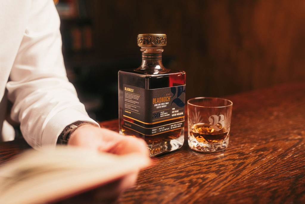 Bladnoch 30 Year Old served beside an open book