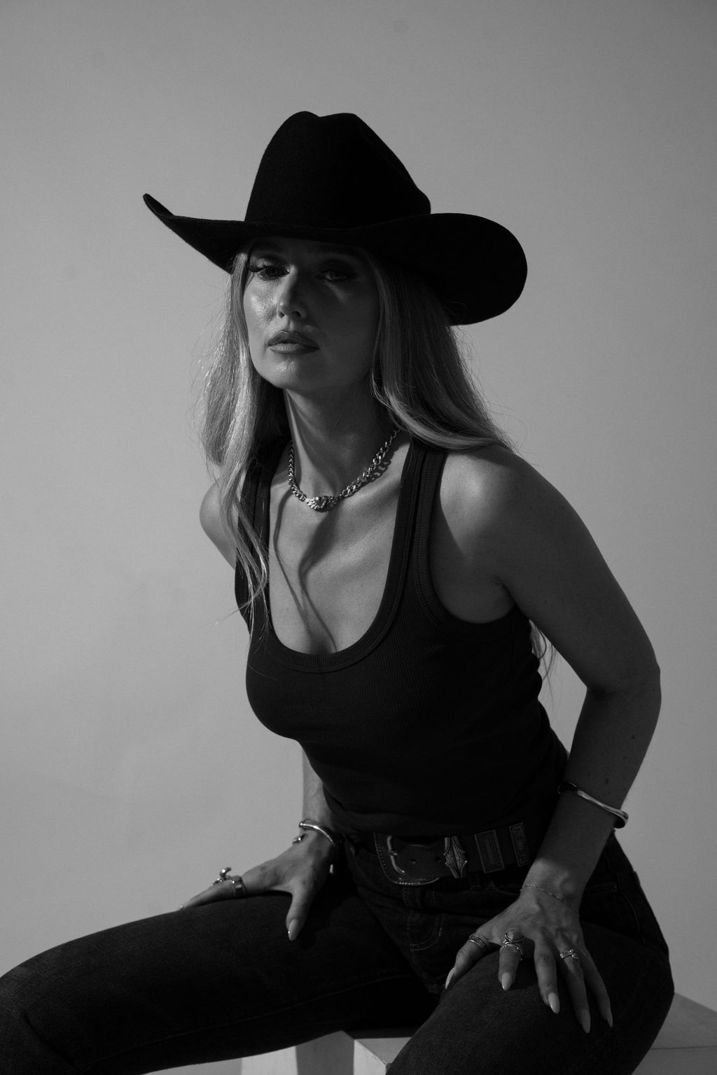 Seated studio portrait of Ashleigh Greenwood for Cowboy Calling