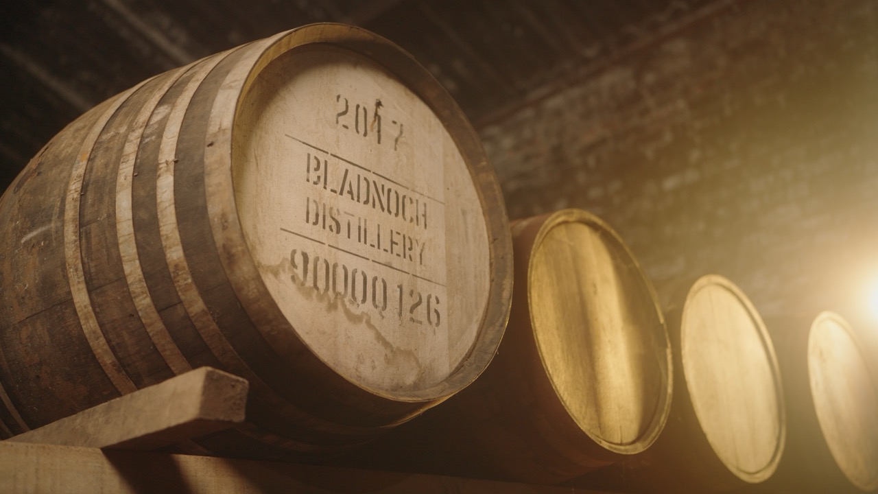 Bladnoch Distillery casks stencilled and stacked in the warehouse