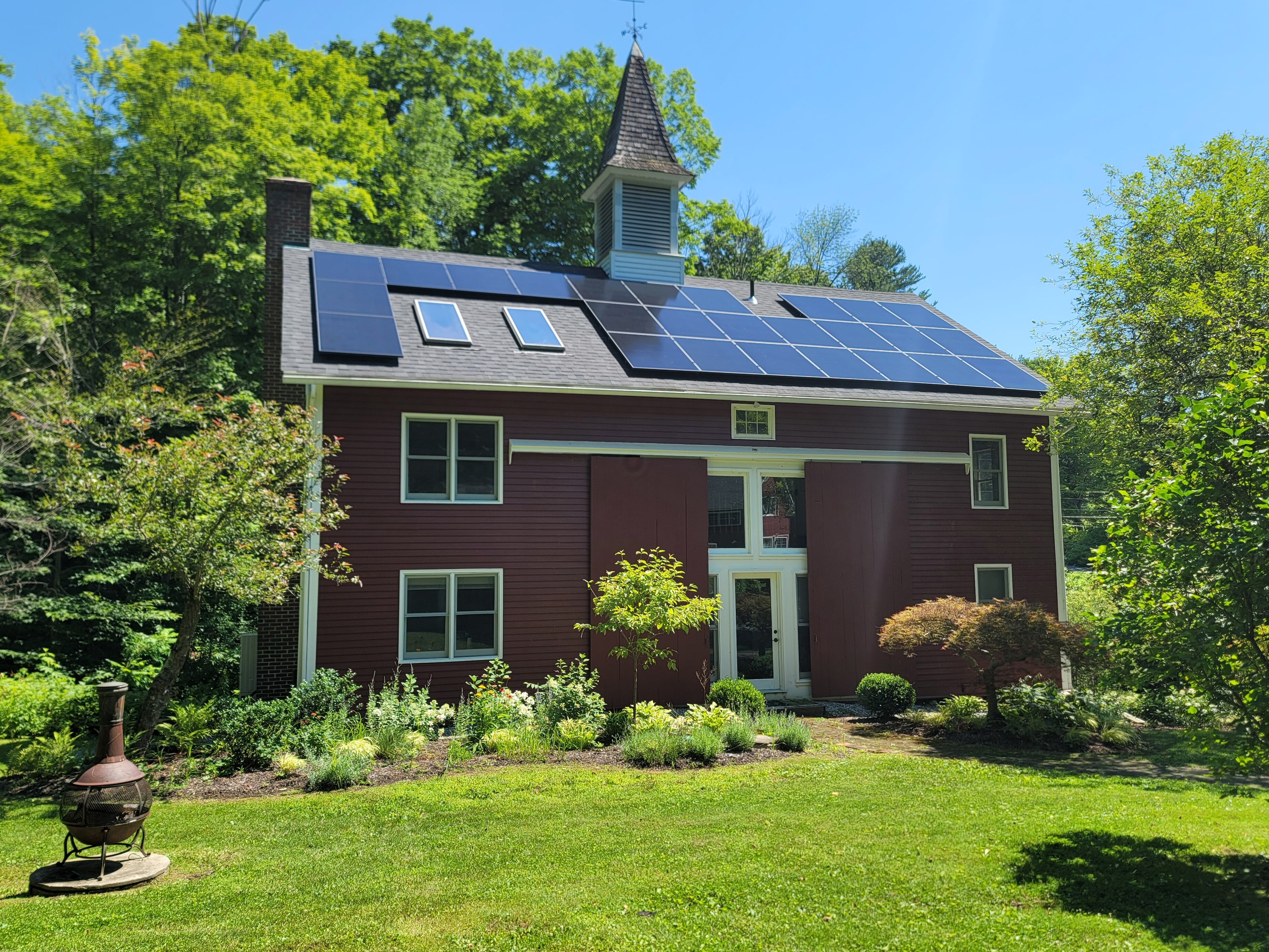 Rooftop solar panel installation in Stockbridge, MA by New England Solar+Green