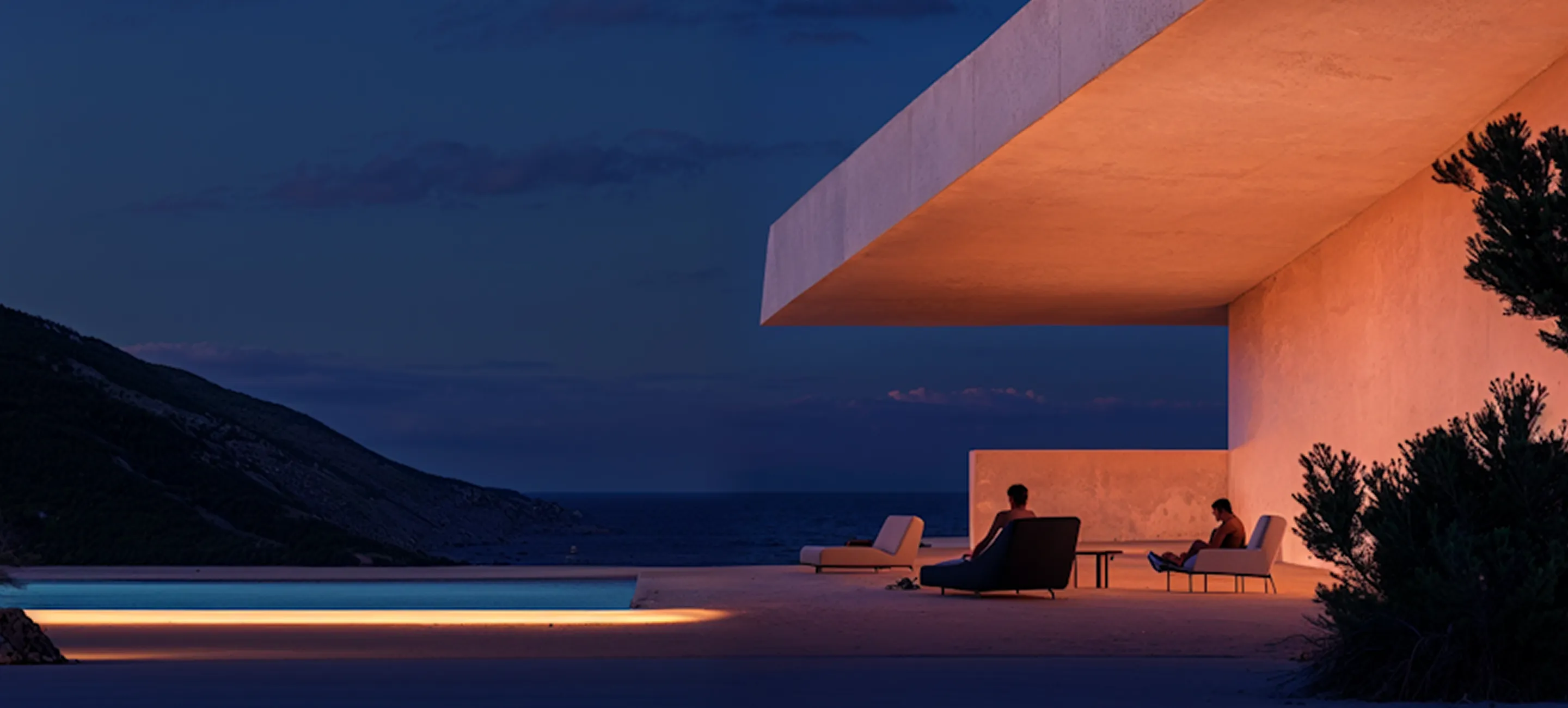 A person sitting on a chair in front of a building.