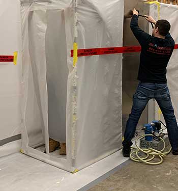 asbestos abatement performed by worker