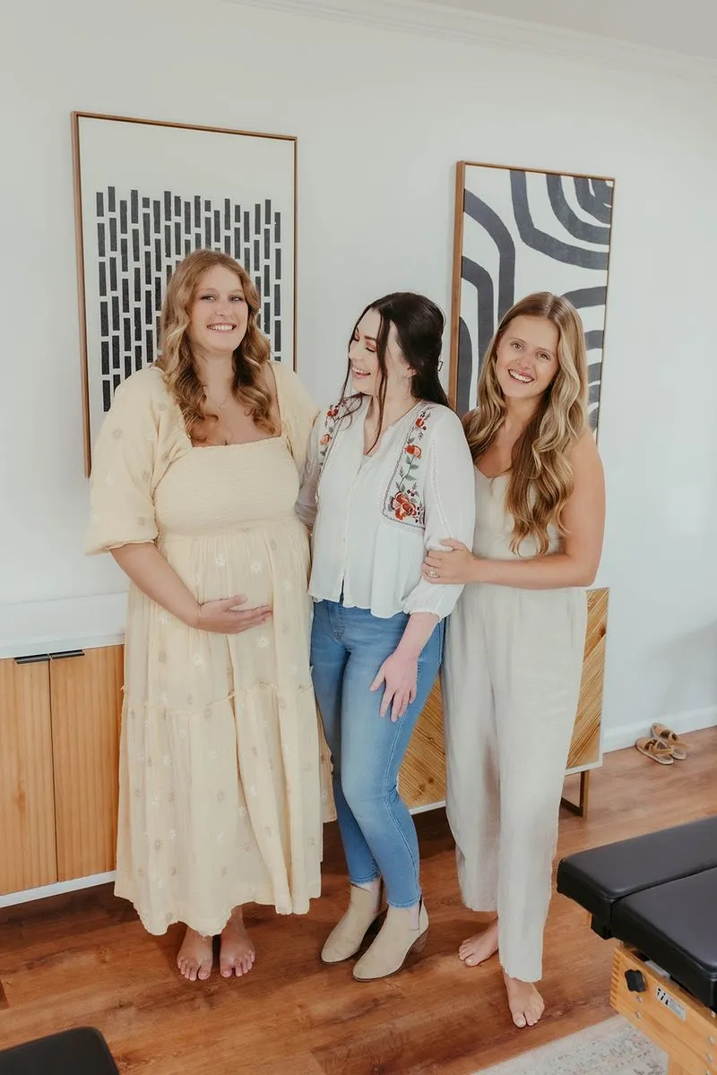 a group of women posing for a picture