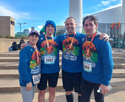 Bart Newman and his family after running a race