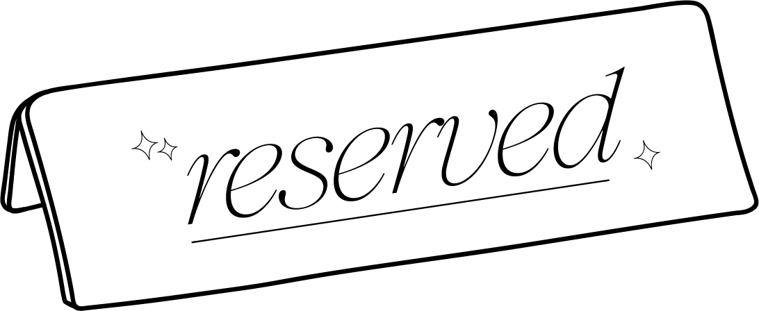 Table tent card with the word 'reserved' underlined and decorated with small sparkle symbols.