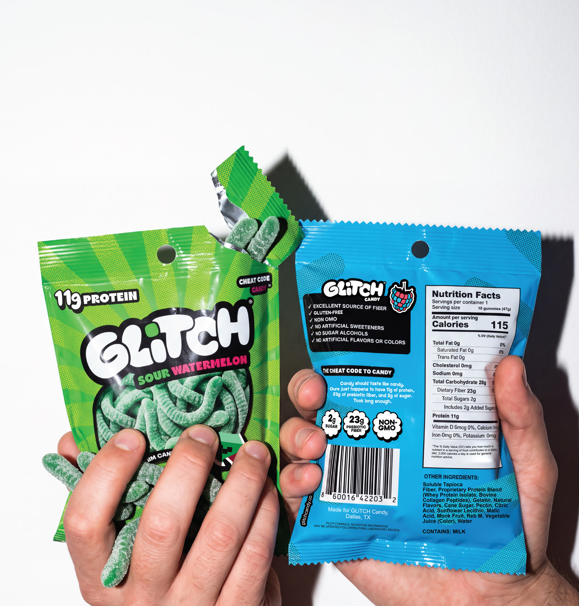 GLiTCH Cheat Code Candy pouches fanned out, high-protein sour gummy worms packaging