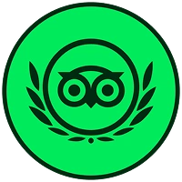 Green circle with a black owl face inside a laurel wreath icon.