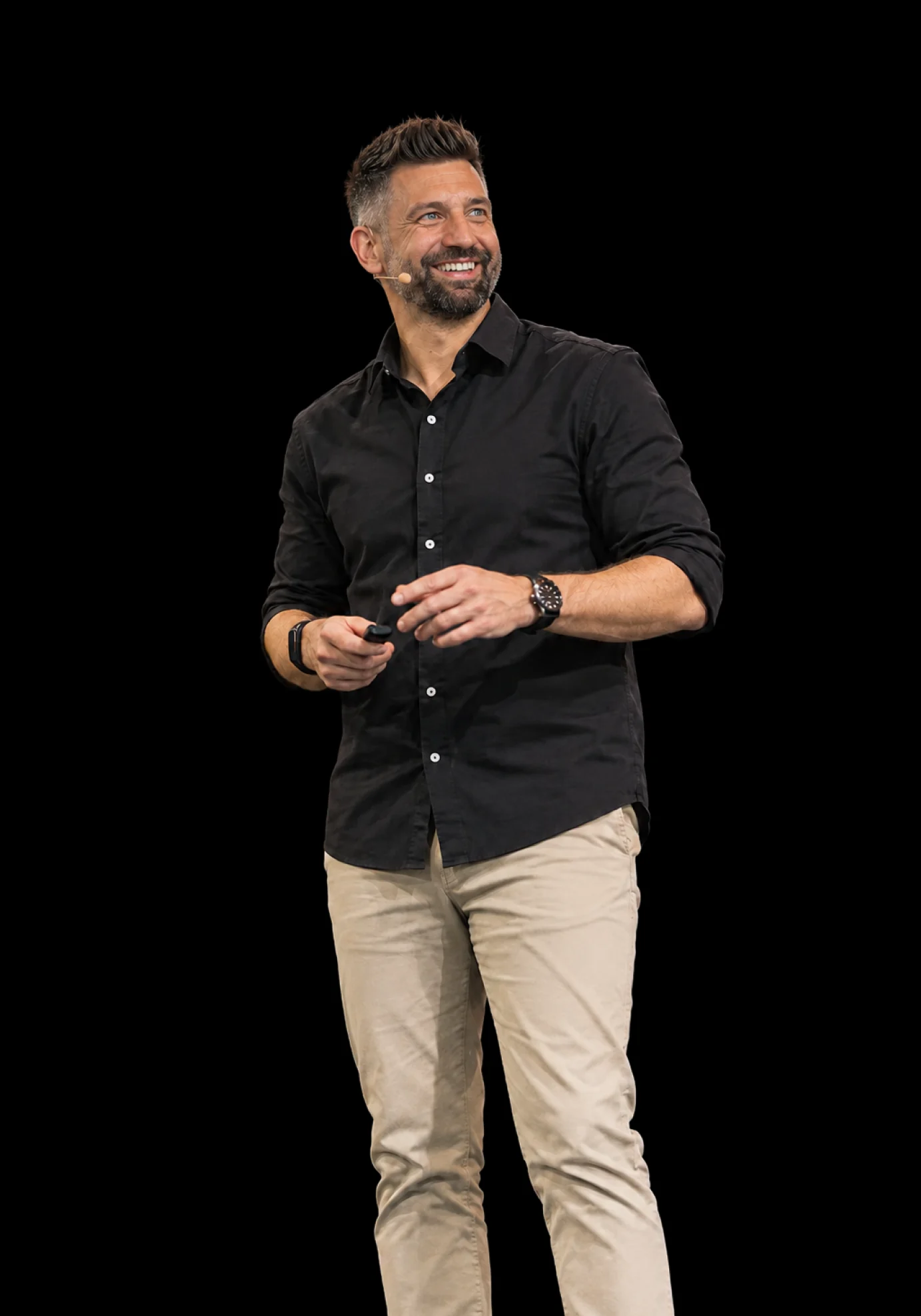 Adam Tregear smiling on stage