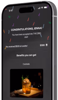 Smartphone screen showing a congratulatory message for Jenna with $500 credits and a cocktail image.