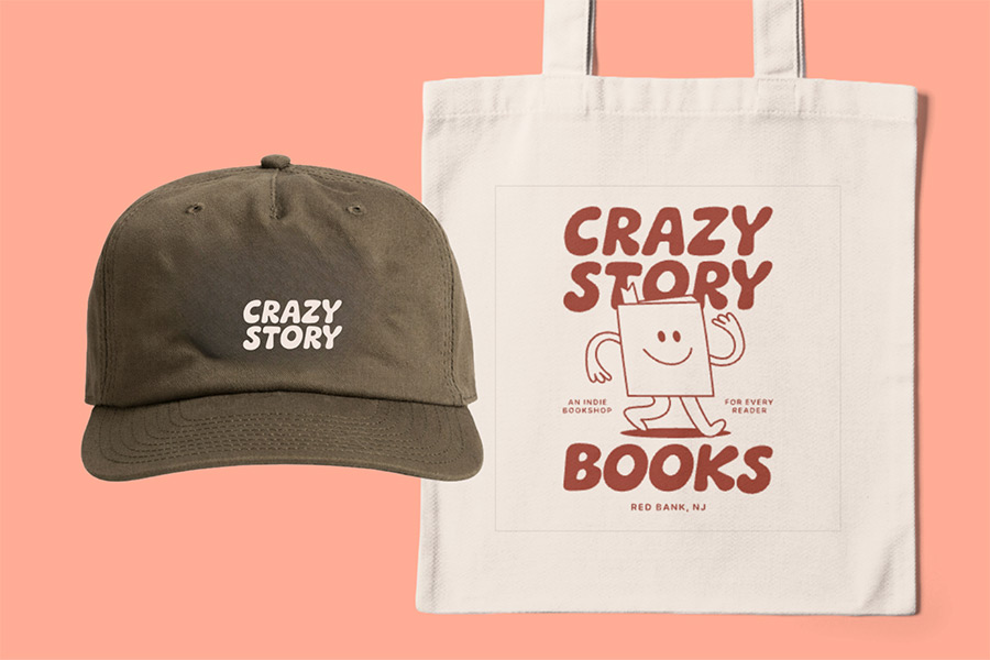 A hat saying and a bag with Crazy Story Books logos