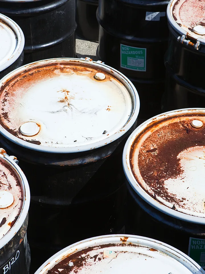 Hazardous waste containers prepared for collection