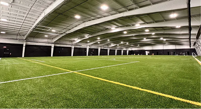 Indoor turf field at 2SP Fieldhouse. This facility features climate-controlled indoor turf suitable for soccer, flag football, and baseball training