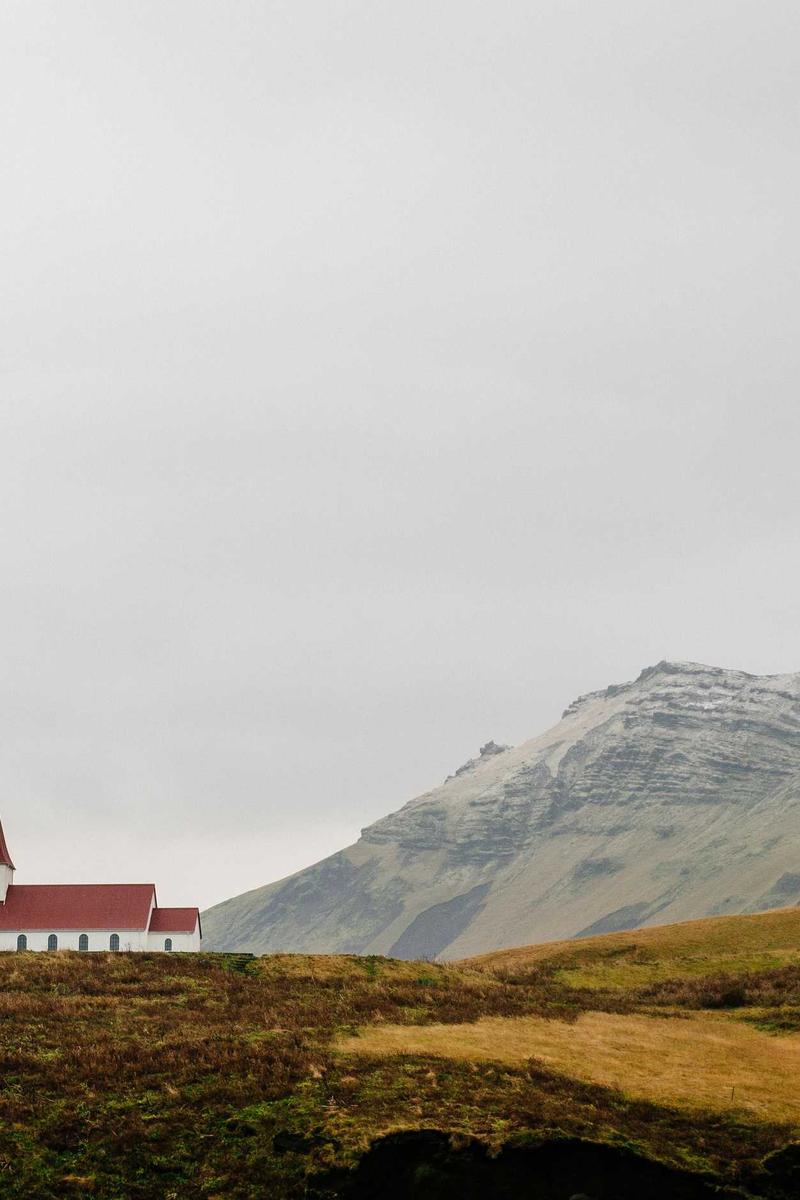 Icelandic church with mountain — default center crop cuts off the church