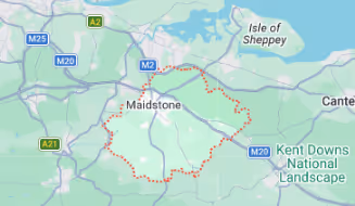 Map highlighting the boundary of Maidstone in Kent, England, near the Isle of Sheppey and Kent Downs National Landscape.