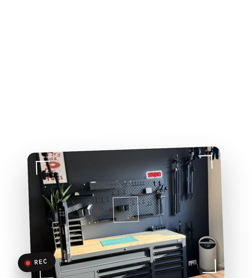The photography workbench seen through a camera viewfinder with a REC label