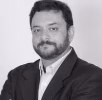 A black and white photograph of Kartik Ganapathy