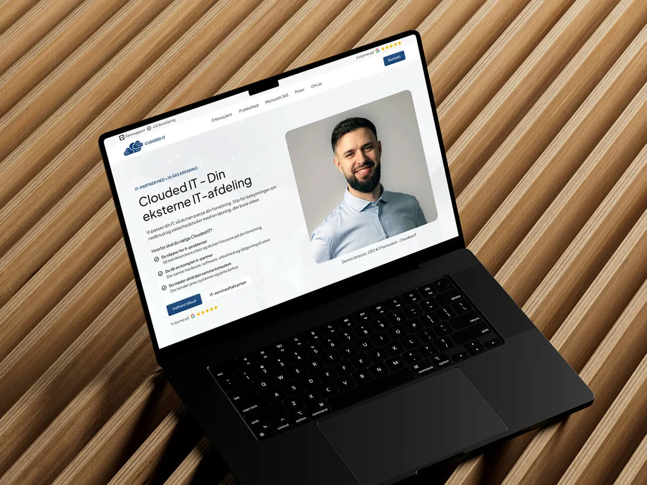 Bærbar computer med Clouded IT nye hjemmeside 