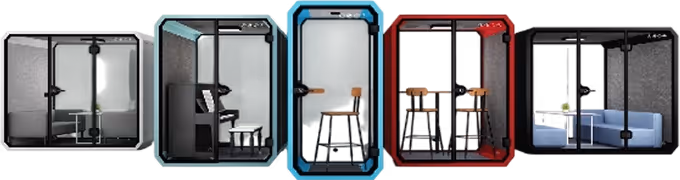 Row of acoustic phone booths and meeting pods in red, blue and grey for offices.