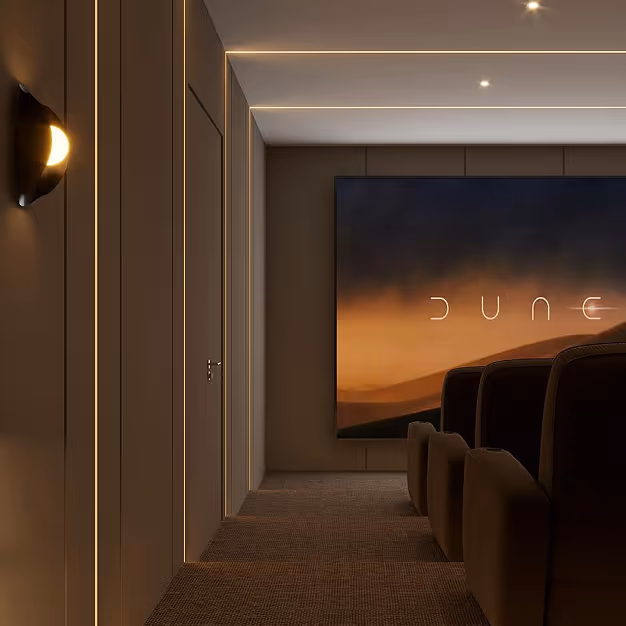 Luxury home cinema with acoustic wood walls, ambient lighting, and Dune on screen.