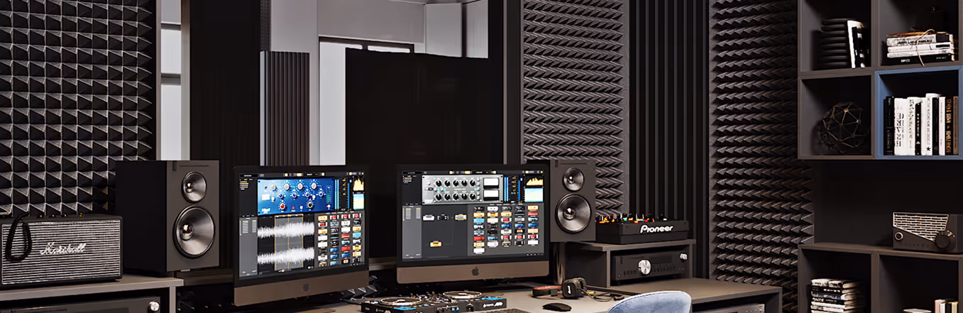 Recording studio with black acoustic foam wall panels, studio monitors and a mixing desk.