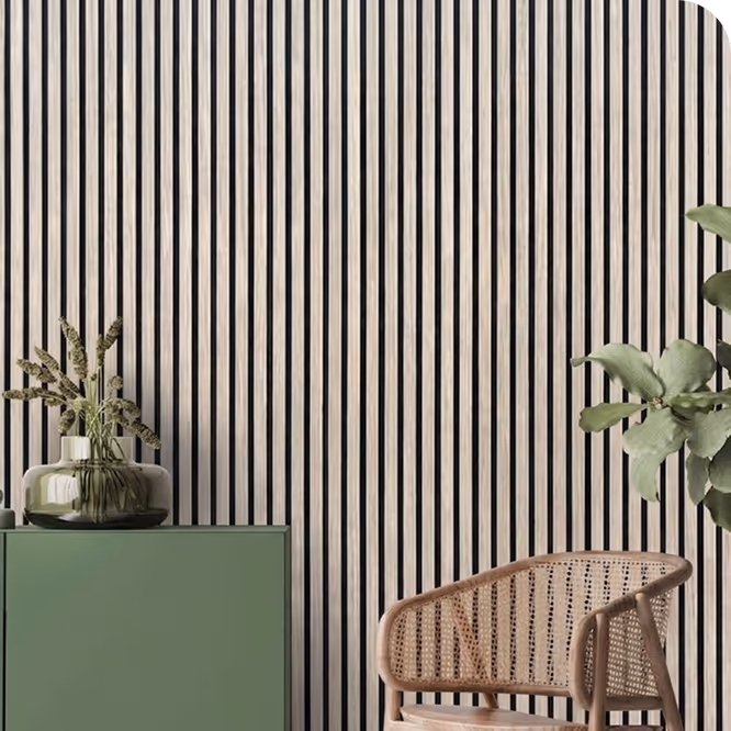 Modern living room with a natural oak acoustic wood slat wall, green sideboard, vase and rattan chair.