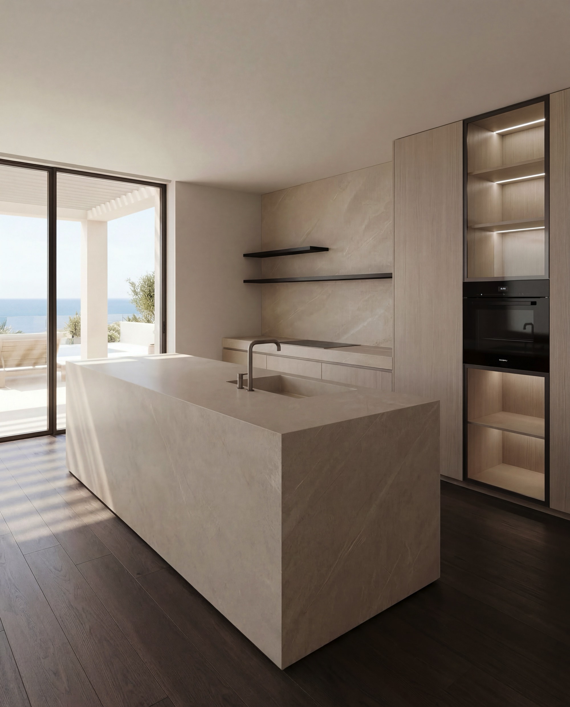 Luxury natural stone kitchen island in Mallorca by AXON Living Manufacture featuring minimalist design, integrated sink and premium materials AXON MANUFACTURE