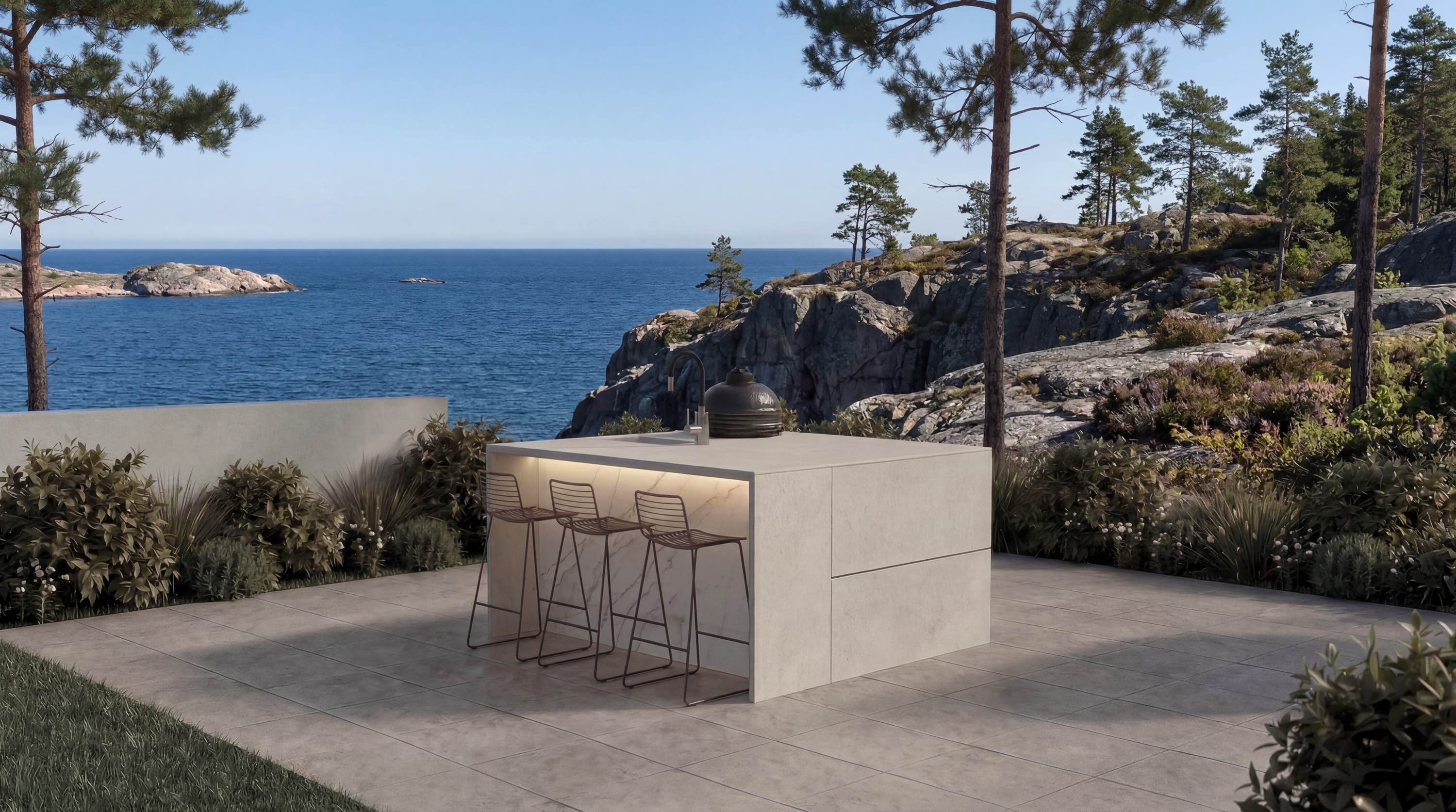 AXON CUBE compact outdoor kitchen on a seaside terrace, combining integrated grill, sink and bar seating within a minimal architectural setting