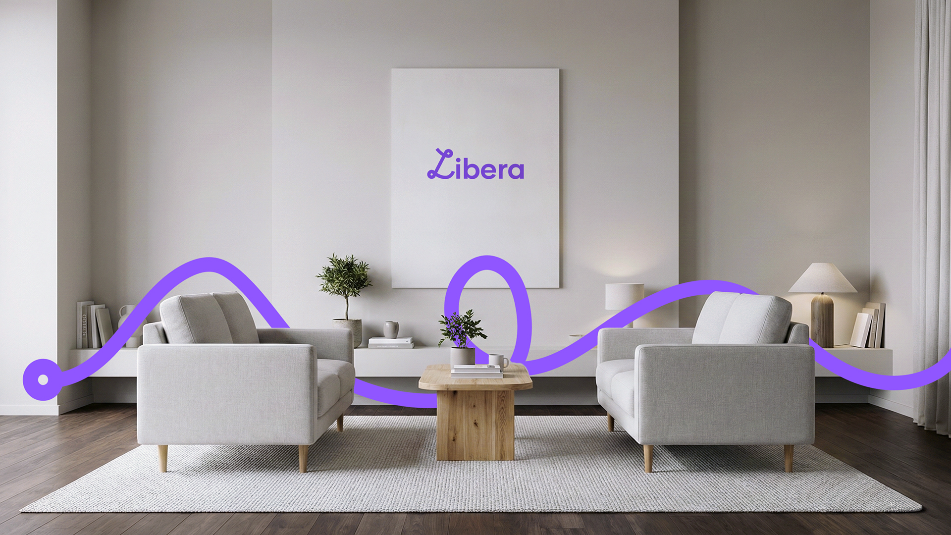 Sala de estar moderna con dos sillones grises, una mesa de madera y un cuadro con la palabra Libera, atravesada por un trazo ondulado de color violeta que recorre la escena