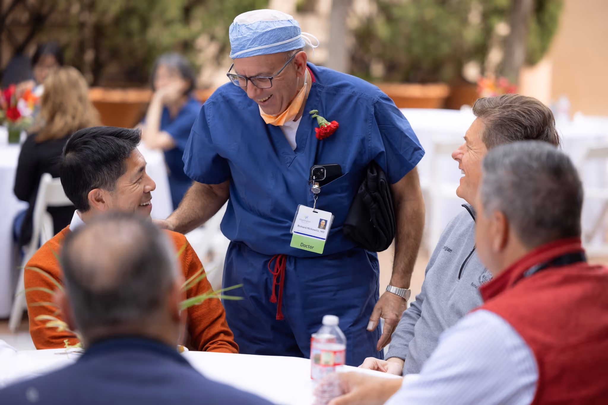Members of a hospital unit posing together after a shift.