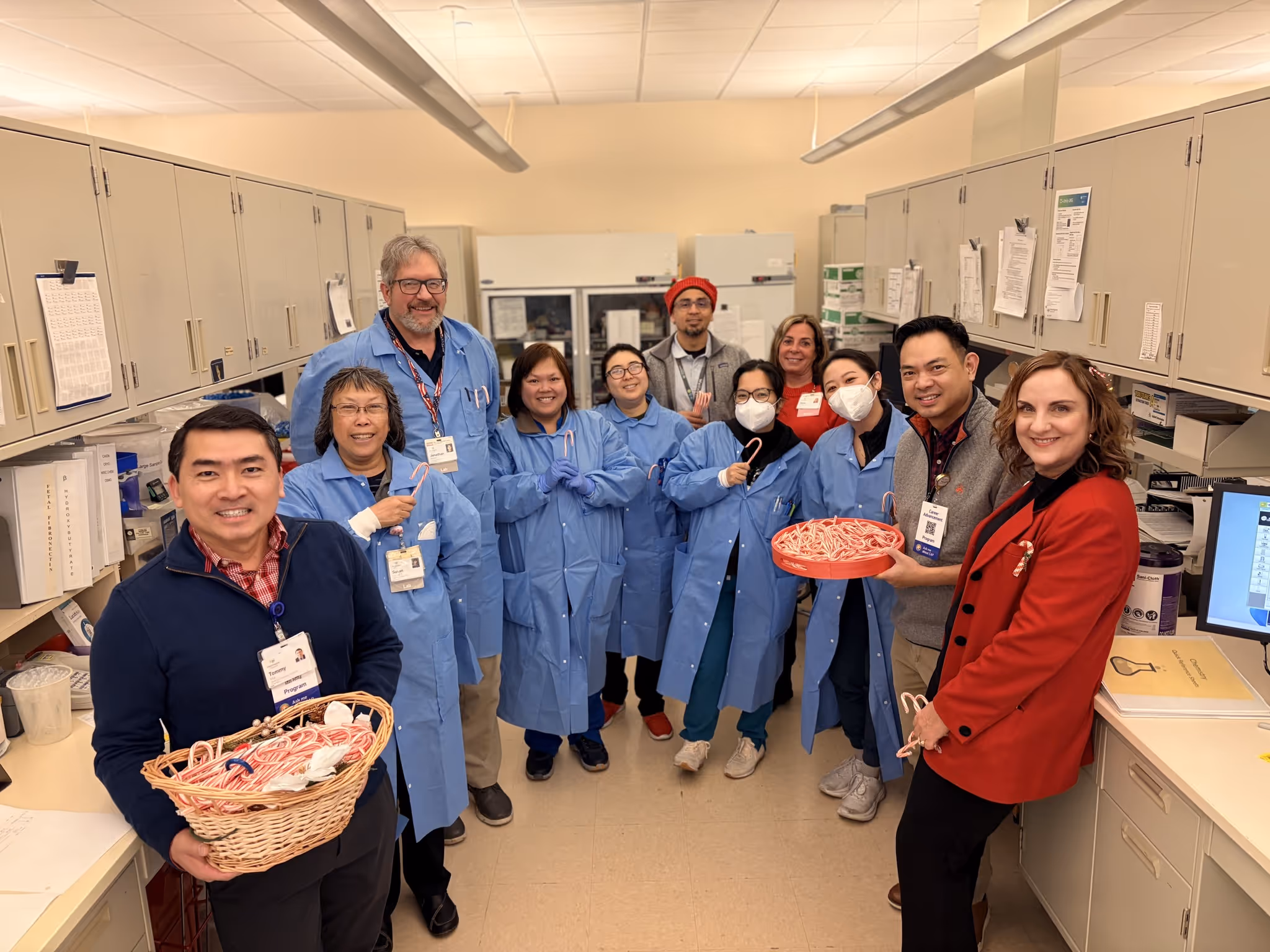 Care team discussion in a bright clinical workspace.
