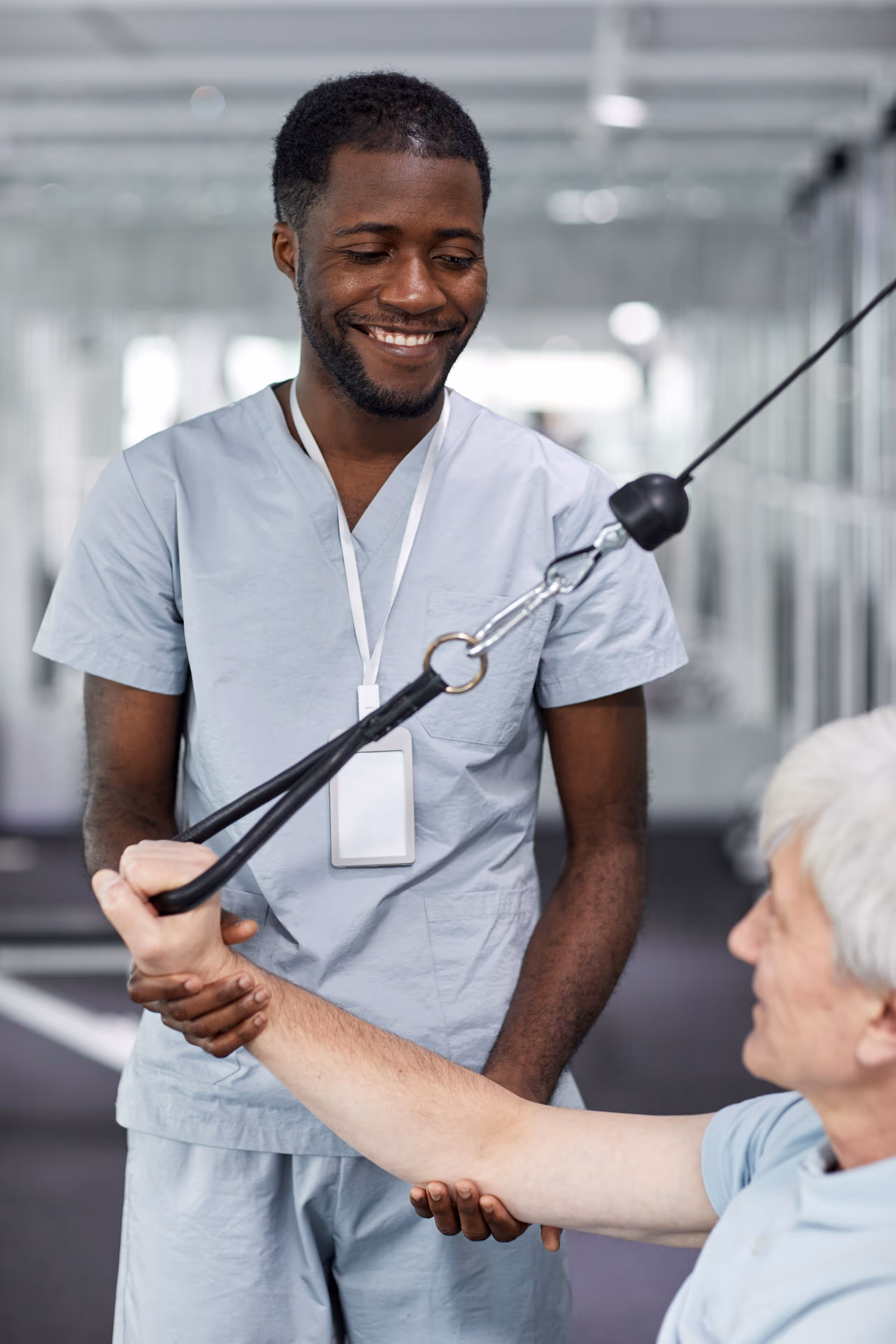 Healthcare workers conferring during patient care or rounds.