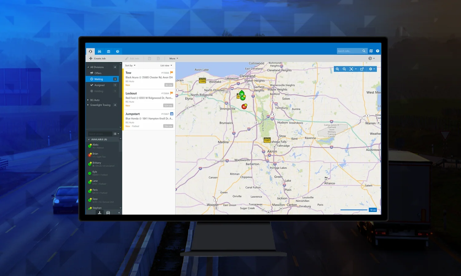 Computer screen displaying a towing management interface with job list and map of Ohio area around Cleveland and Akron.