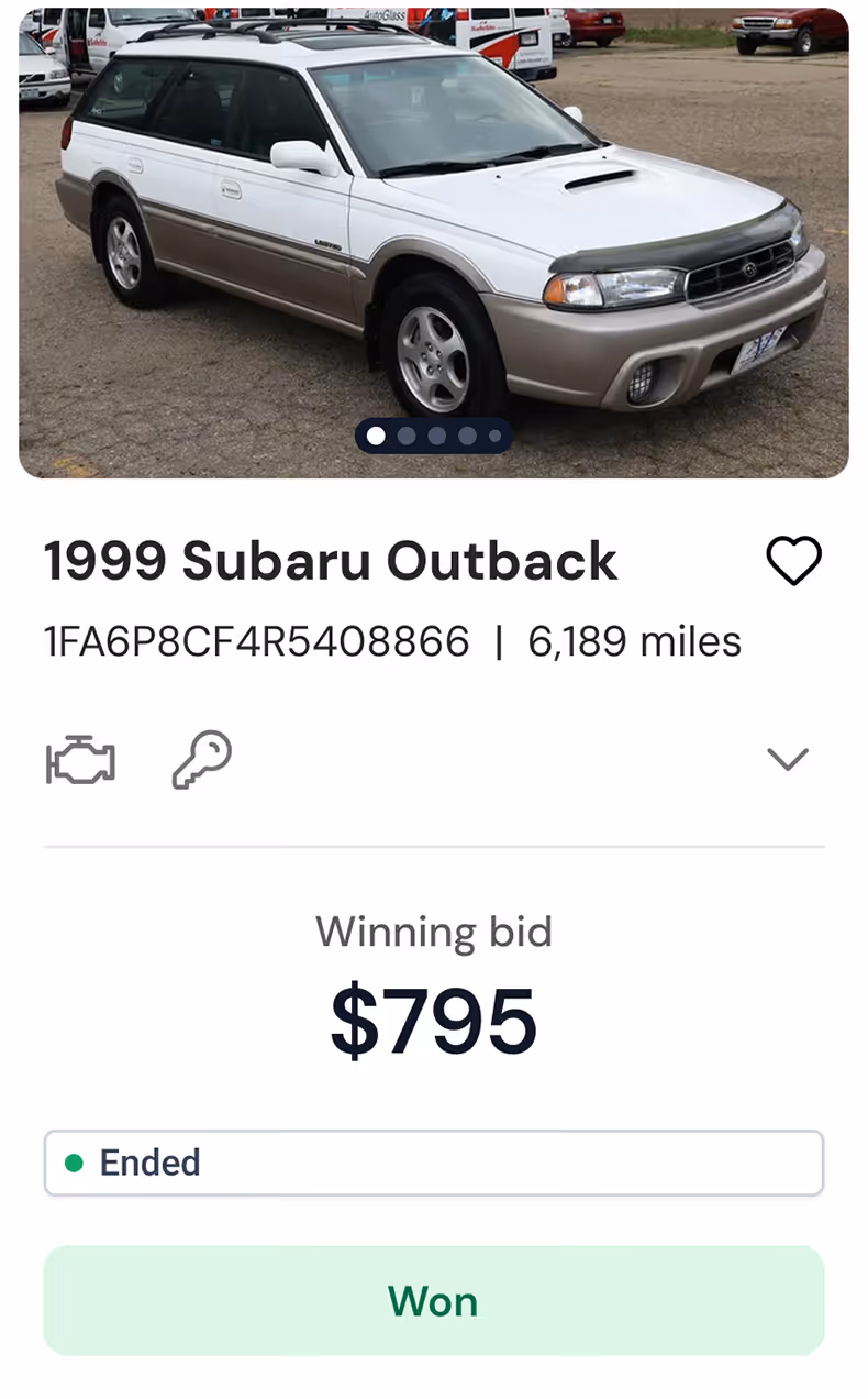 Screenshot showing a 1999 Subaru Outback vehicle auction won with a winning bid of $795
