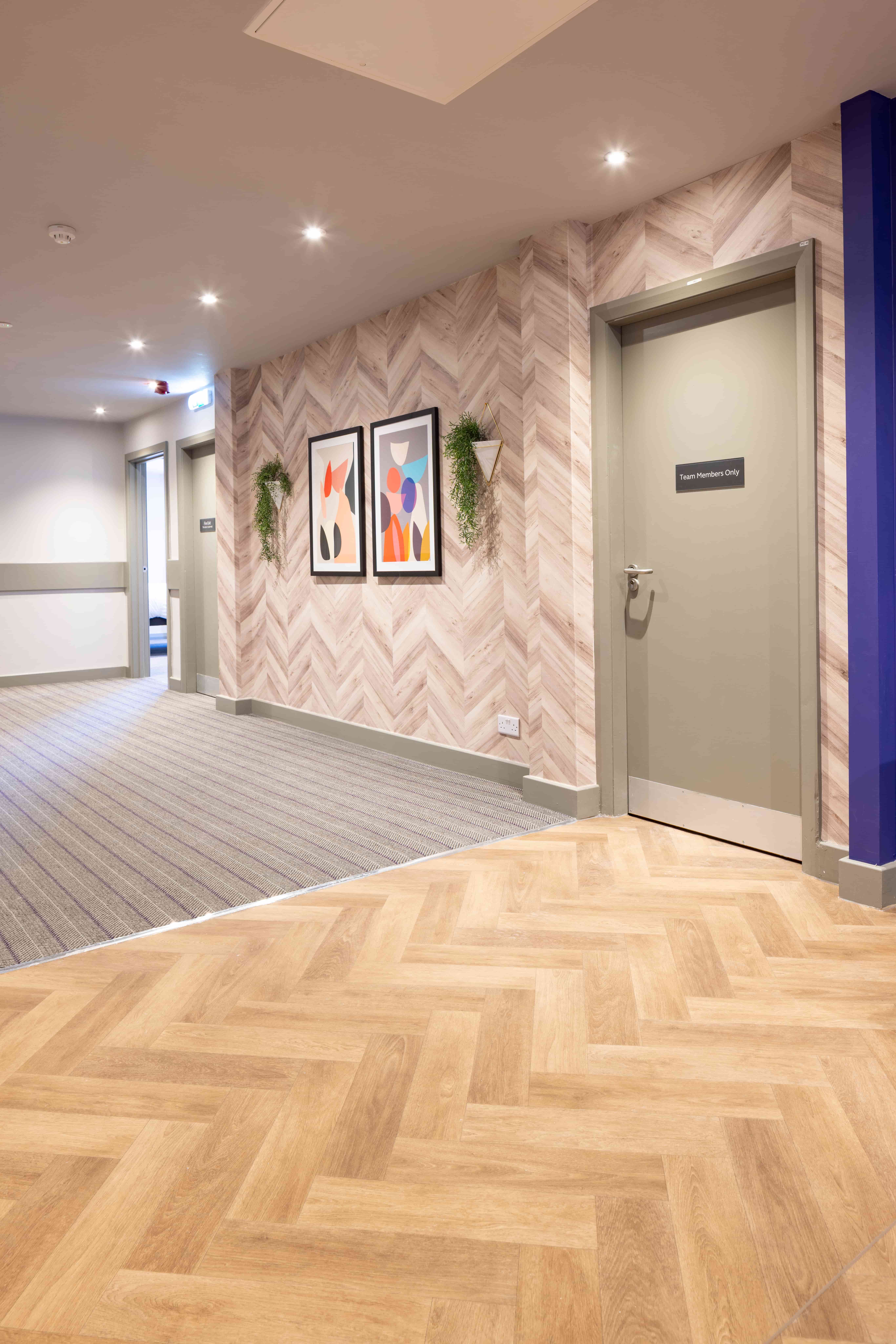 A case study image of new flooring in a commercial building.