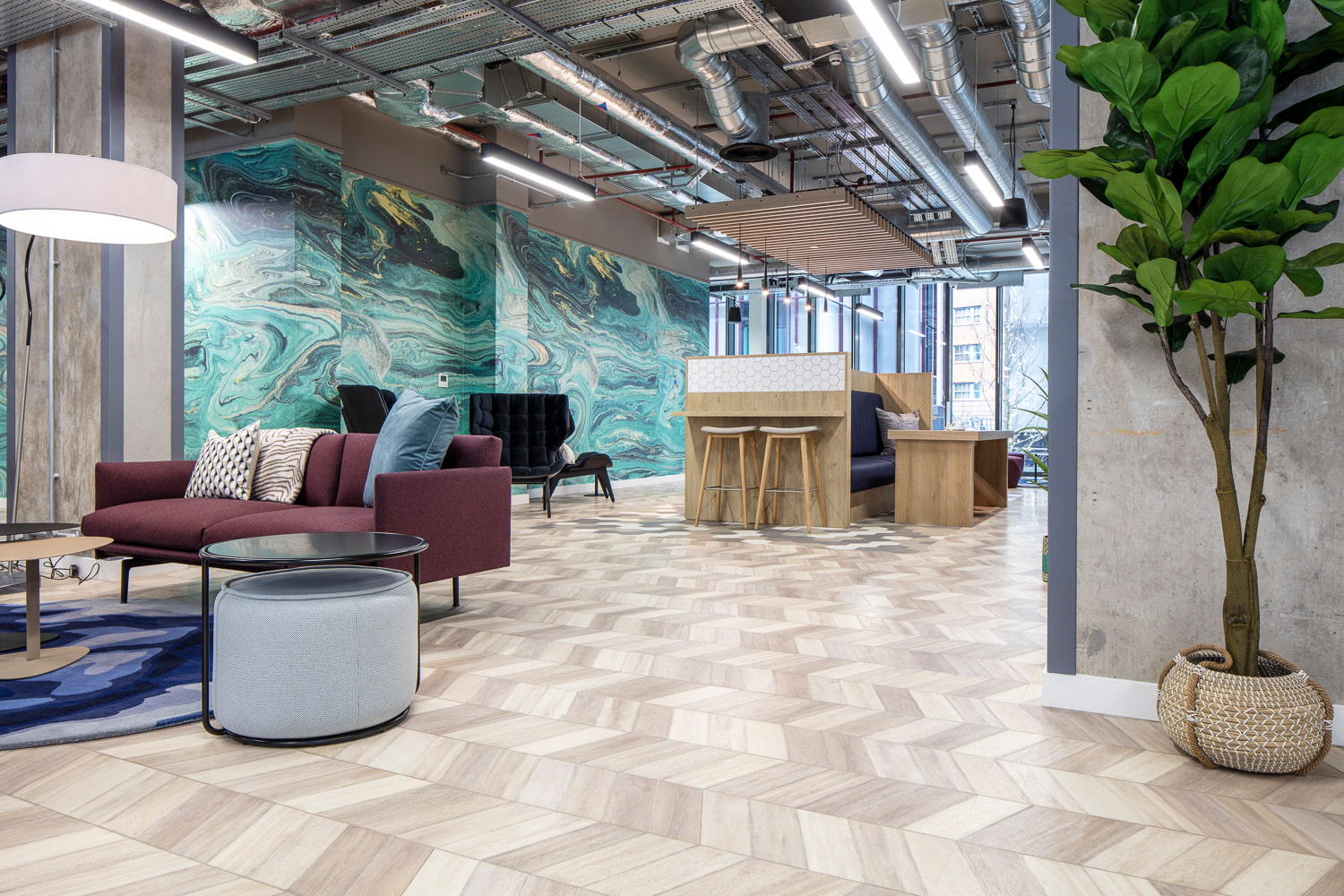 A case study image displaying a multi-functional open layout seating room.