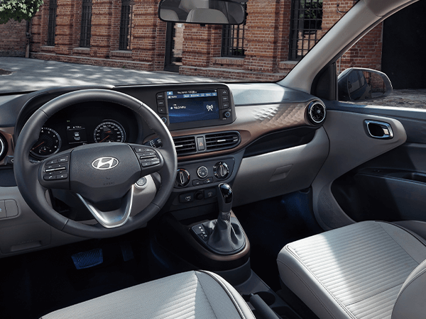 Hyundai Grand i10 Sedán — banner de interior