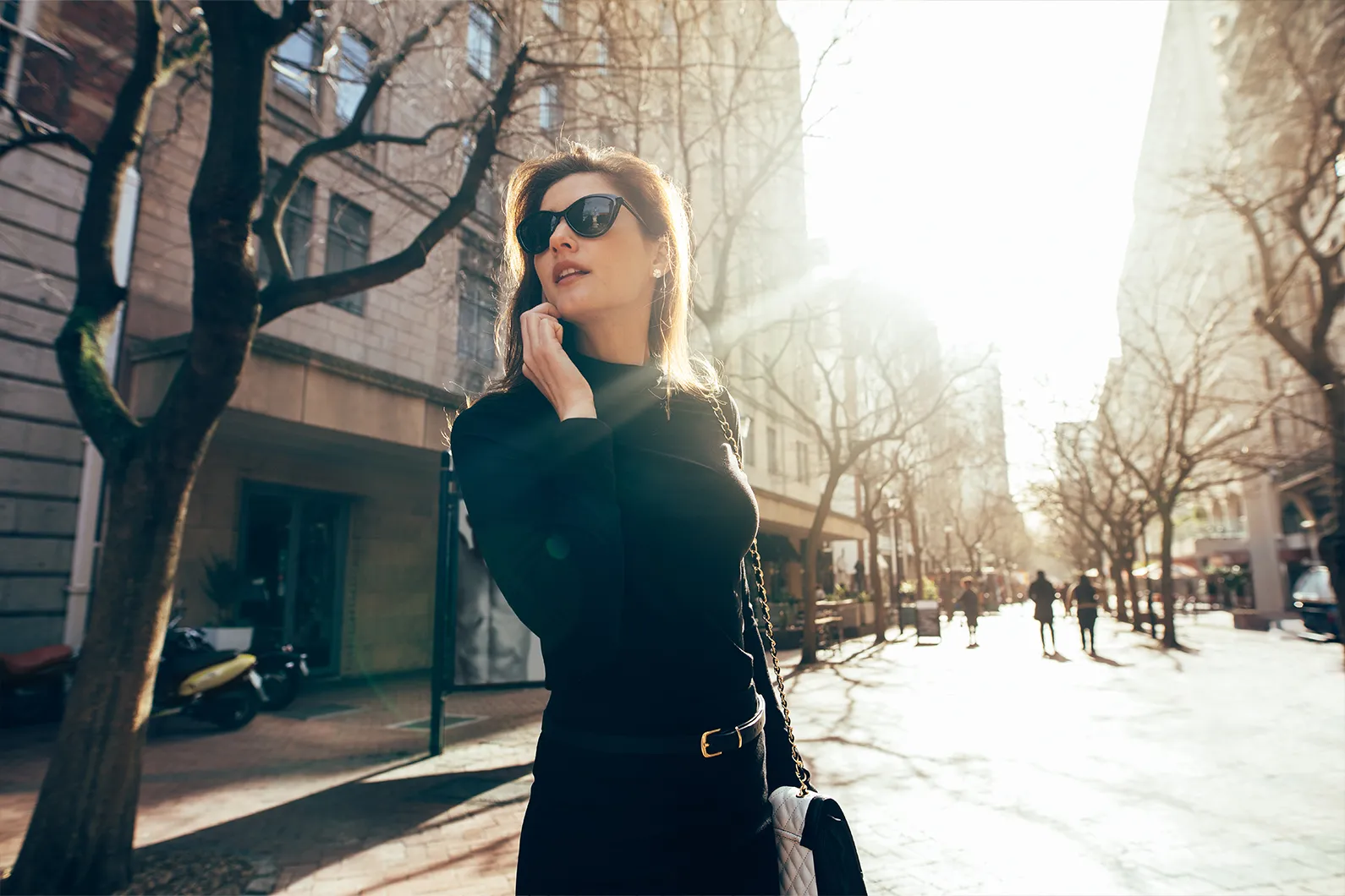 woman with sunglasses walking stock image