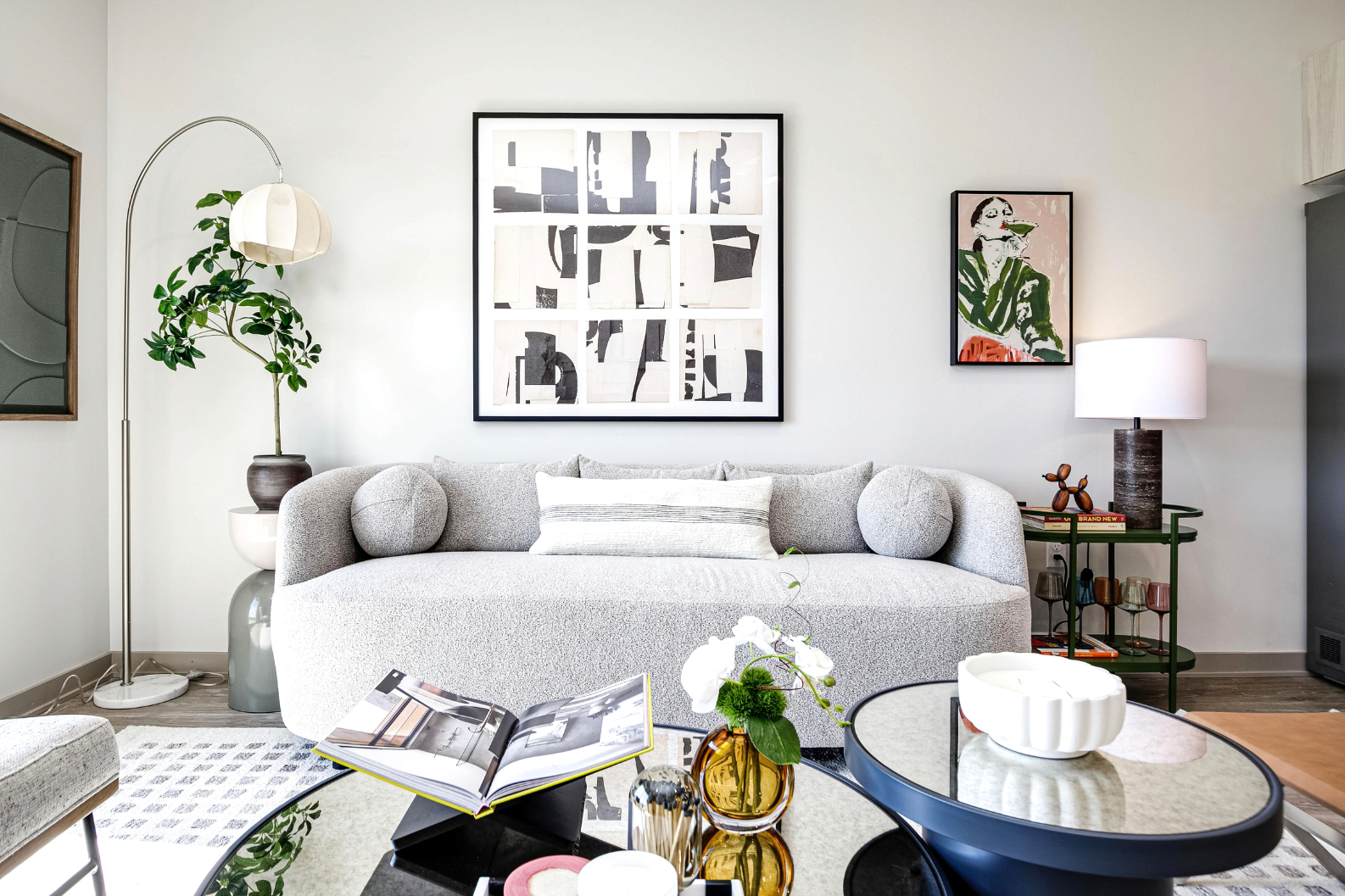 Living area with sofa, coffee table, and decor